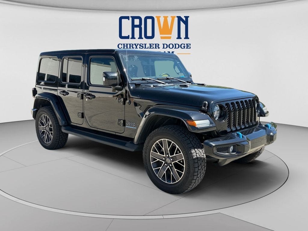 2023 Jeep Wrangler Sahara 4xe in Black Clearcoat — front three-quarter view