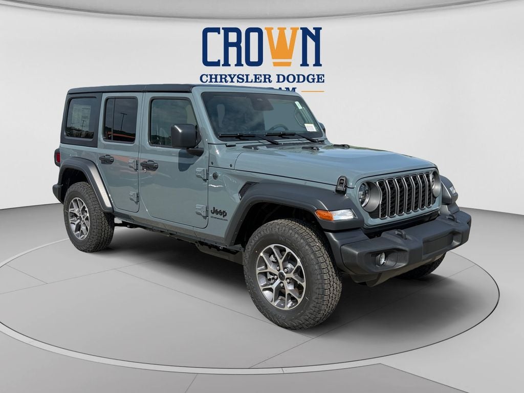 2026 Jeep Wrangler Sport S in Anvil Clear Coat — front three-quarter view
