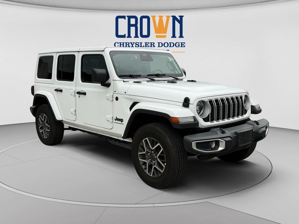 2026 Jeep Wrangler Sahara in Bright White Clearcoat — front three-quarter view