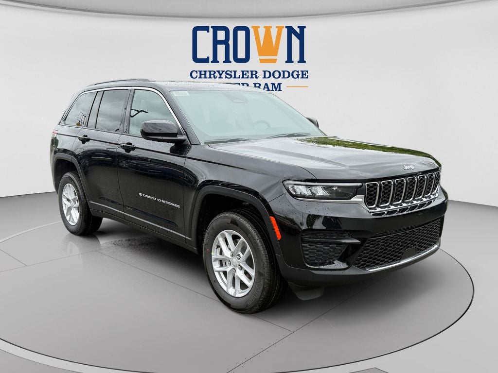 2026 Jeep Grand Cherokee Laredo in Diamond Black Crystal Pearlcoat — front three-quarter view