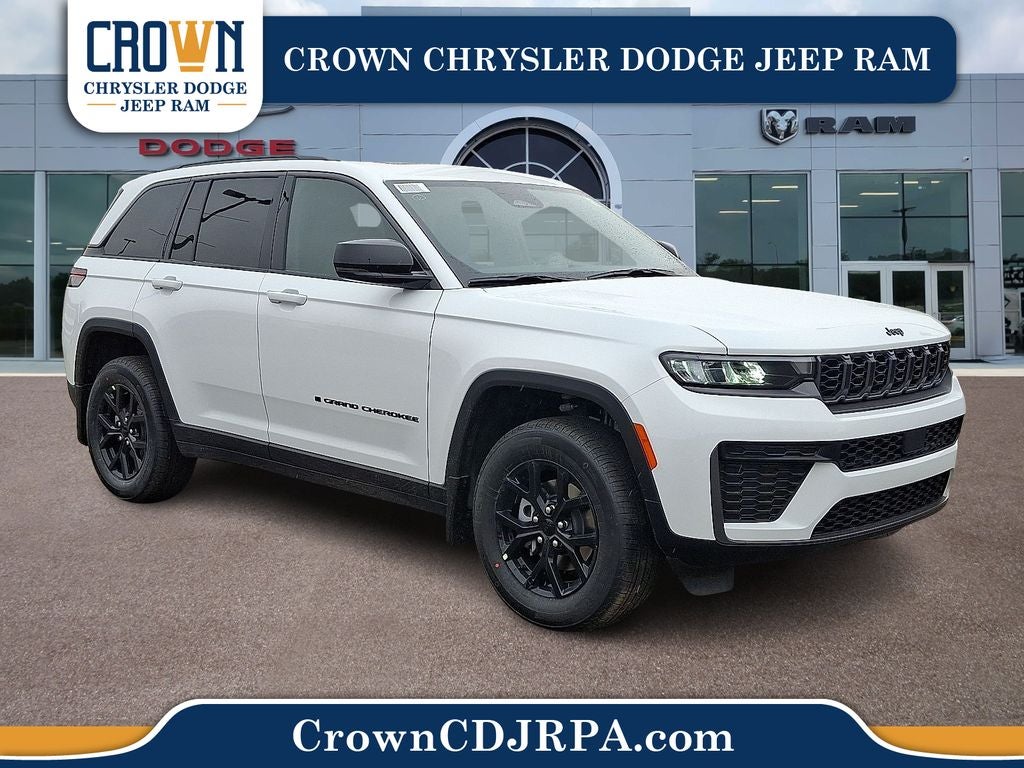 2026 Jeep Grand Cherokee Altitude in Bright White Clearcoat — front three-quarter view
