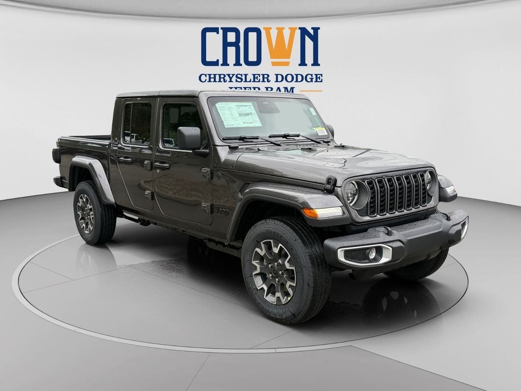 2026 Jeep Gladiator Sahara in Granite Crystal Metallic Clearcoat — front three-quarter view
