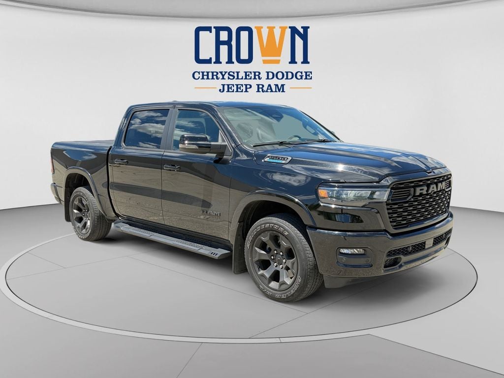 2025 RAM 1500 Big Horn/Lone Star in Diamond Black Crystal Pearlcoat — front three-quarter view