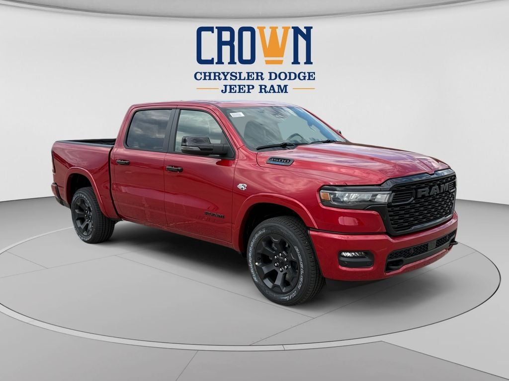 2026 RAM 1500 Big Horn/Lone Star in Molten Red Pearlcoat — front three-quarter view