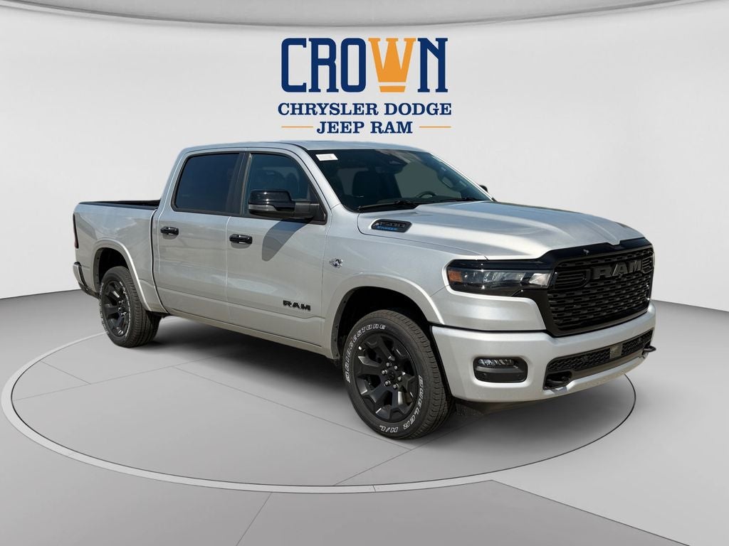 2026 RAM 1500 Big Horn/Lone Star in Silver Zynith — front three-quarter view