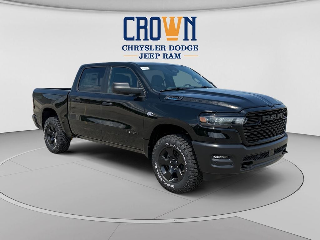 2026 RAM 1500 Warlock in Diamond Black Crystal Pearlcoat — front three-quarter view