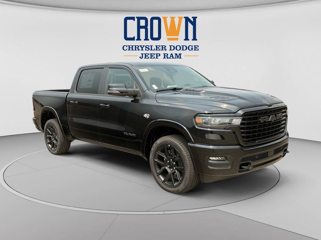 2026 RAM 1500 Laramie in Diamond Black Crystal Pearlcoat — front three-quarter view