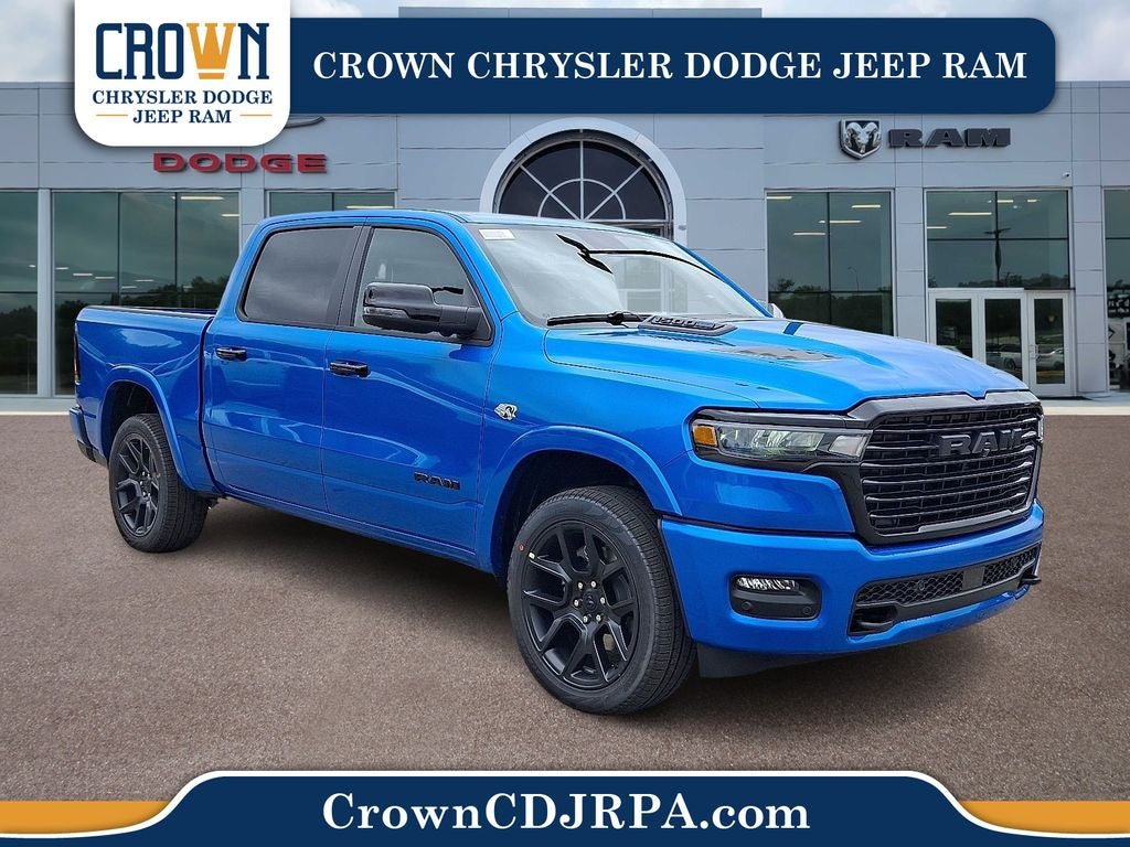 2026 RAM 1500 Laramie in Hydro Blue Pearlcoat — front three-quarter view