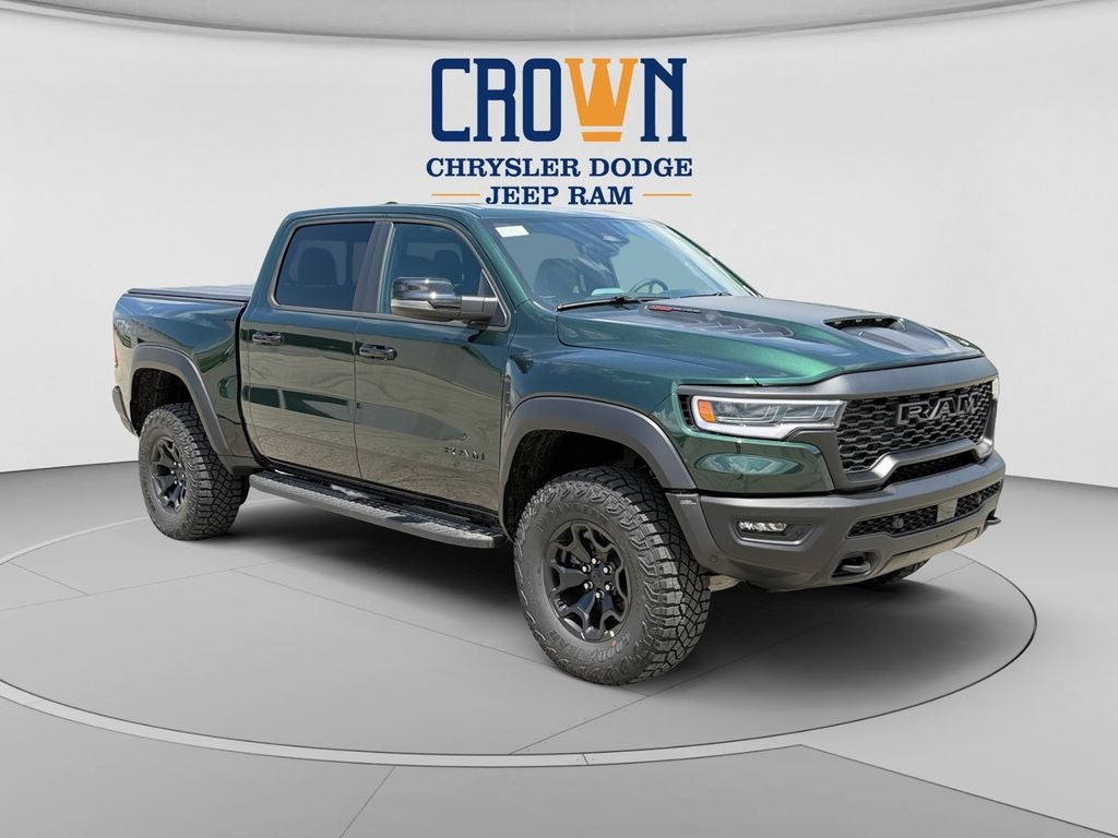 2026 RAM 1500 RHO in Serrano Green Metallic — front three-quarter view