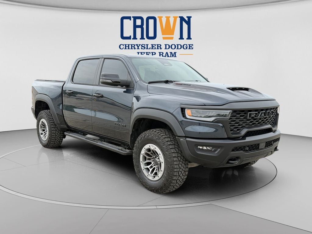 2026 RAM 1500 RHO in Forged Blue Metallic — front three-quarter view