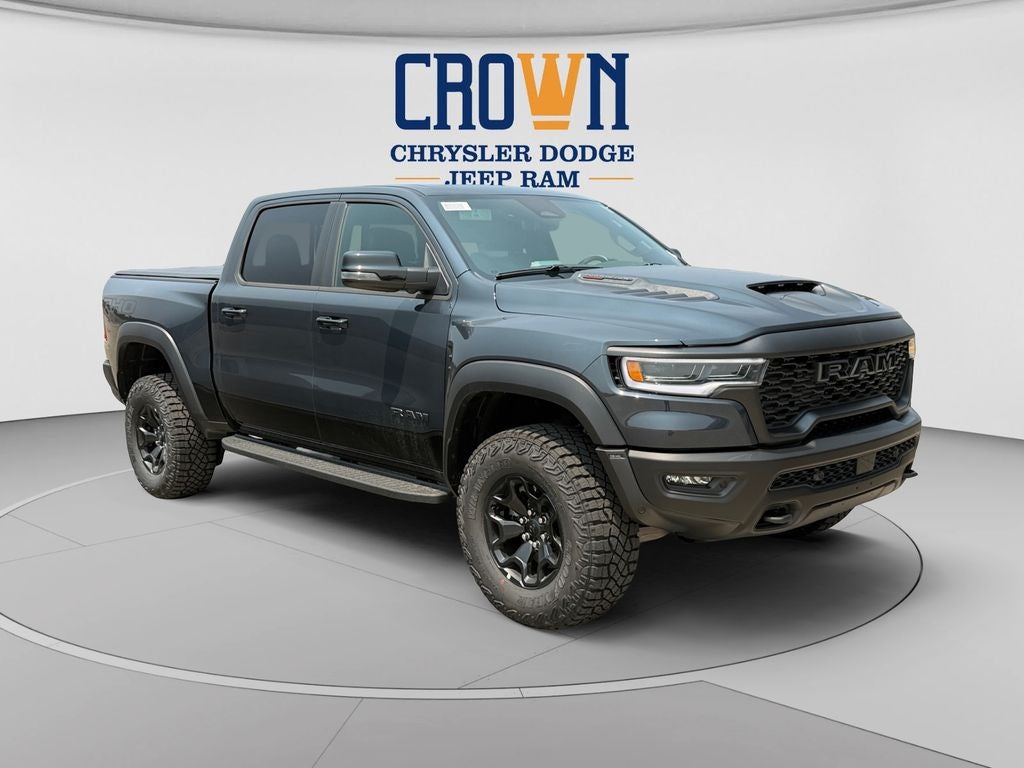 2026 RAM 1500 RHO in Forged Blue Metallic — front three-quarter view