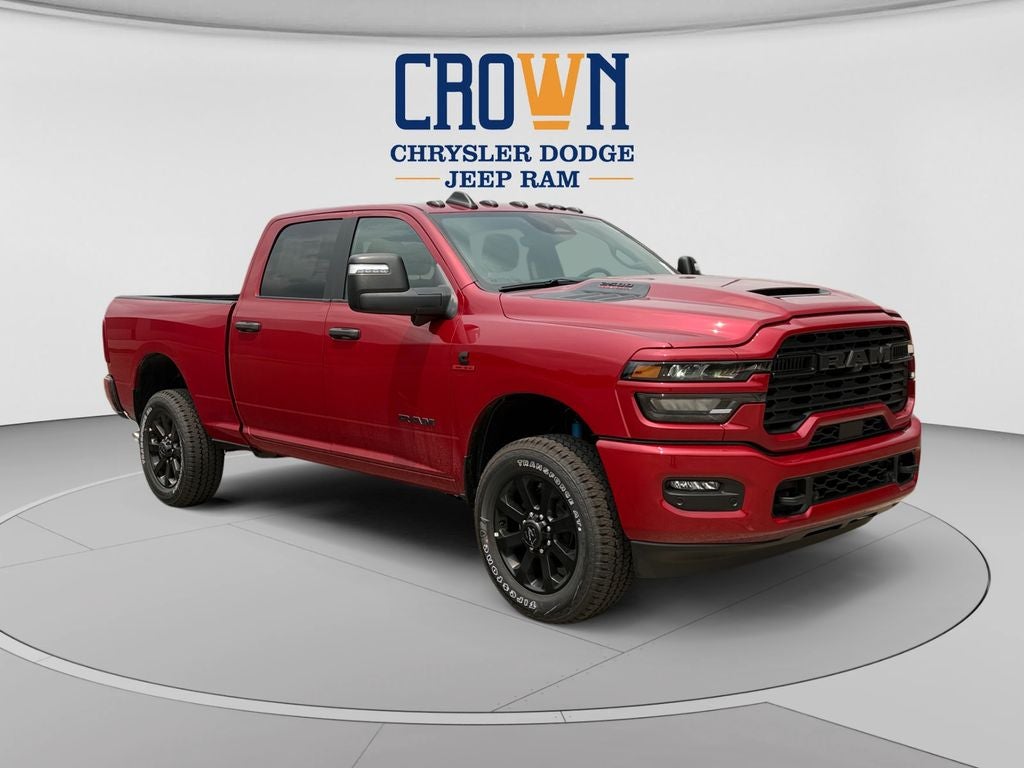 2026 RAM 2500 Big Horn in Molten Red Pearlcoat — front three-quarter view