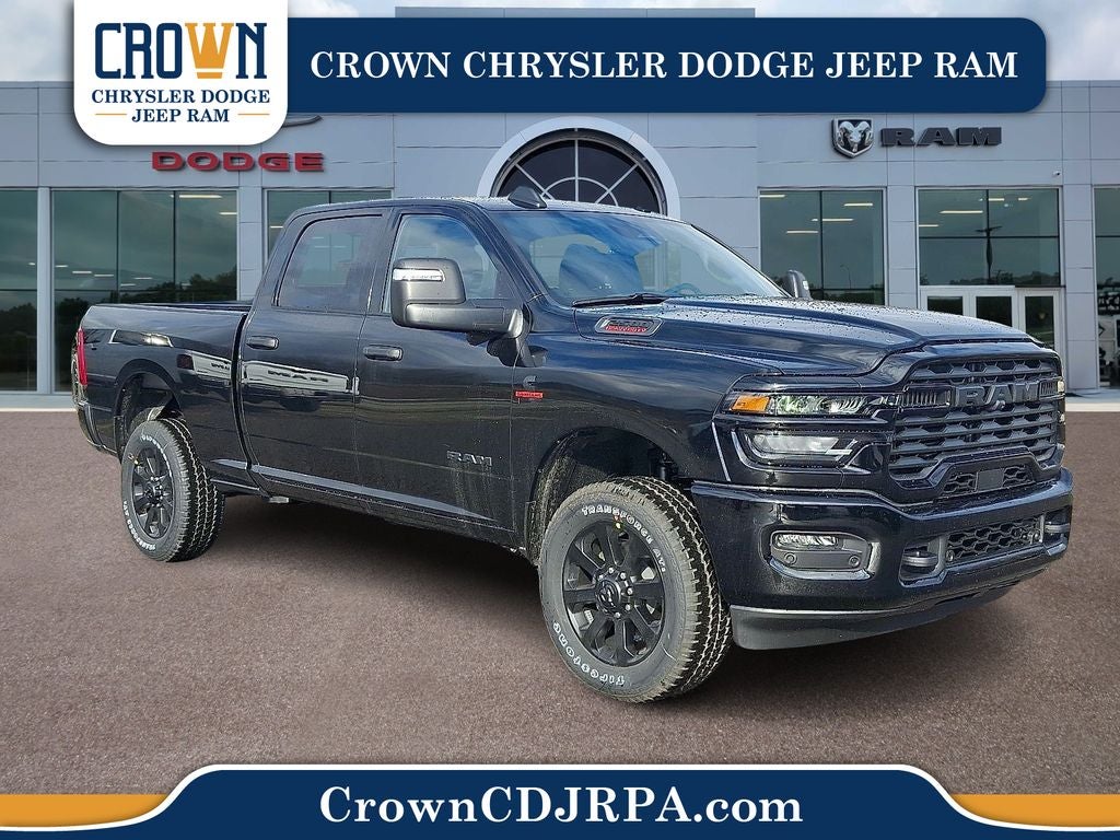 2026 RAM 2500 Big Horn in Diamond Black Crystal Pearlcoat — front three-quarter view