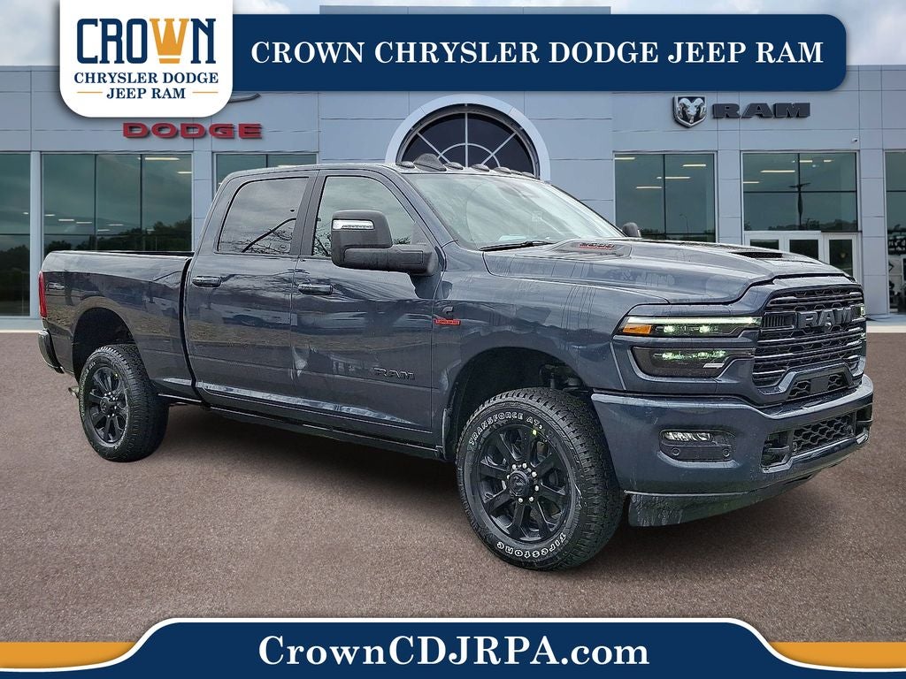 2026 RAM 2500 Laramie in Forged Blue Metallic — front three-quarter view