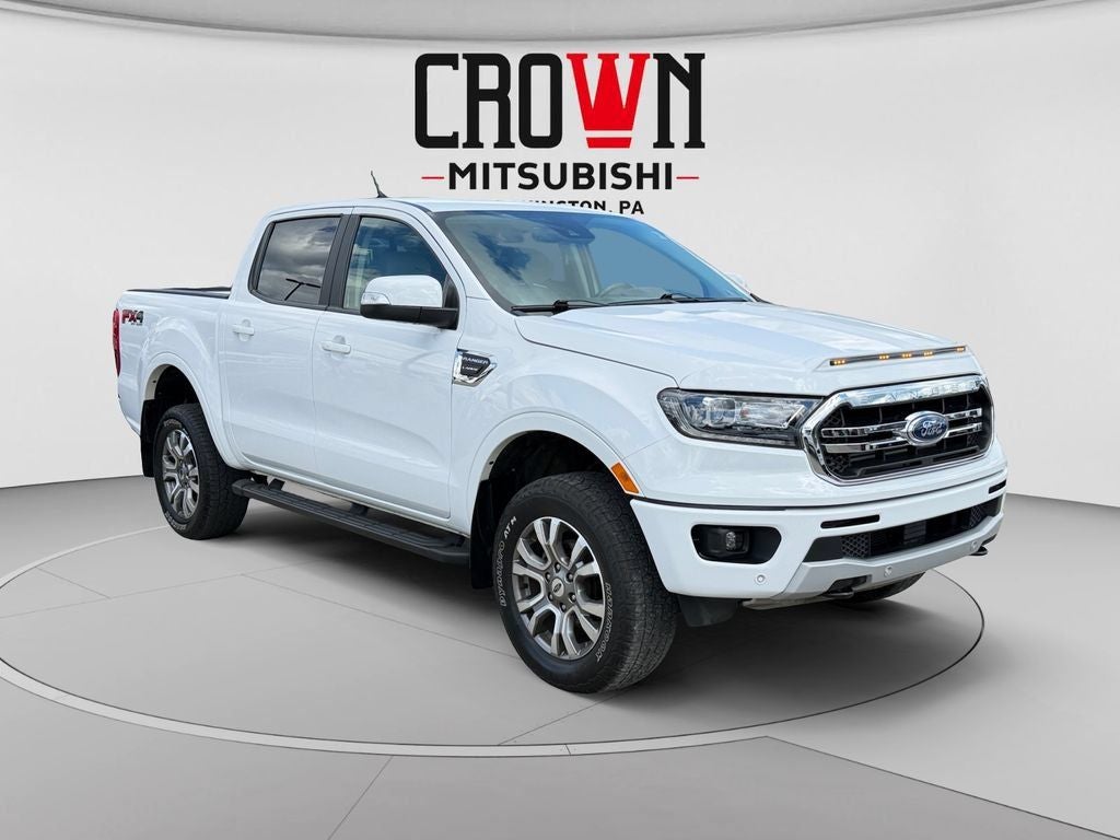 2023 Ford Ranger Lariat in Oxford White — front three-quarter view